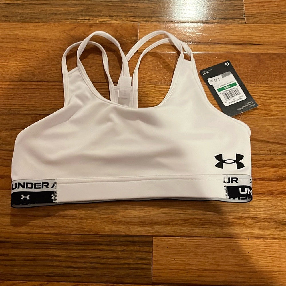 Bra with no pads and crossover back and 4 stings up top brand new never worn